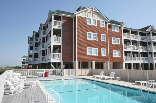 Sound front condo, pool, water access, & sunsets