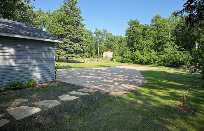 Big Pine Lakefront Retreat with Private Beach, Dock, Fire Pit & Sunset Views