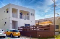 Roof Balcony with BBQ and Jacuzzi Projector Equi Hotels in Nakijin