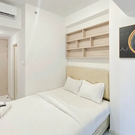 Warm and Simply Studio at Tokyo Riverside PIK 2 Apartment By Travelio