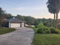 Charming lakefront 3BR 3BA house w/ EV chg in heart of Mt. Dora. Nature abounds.