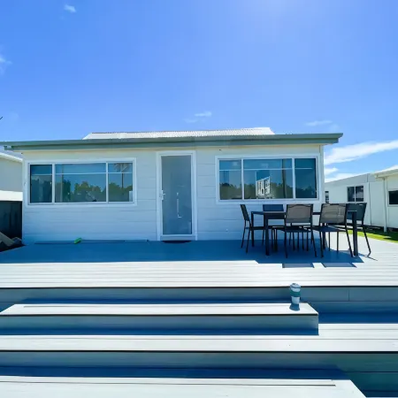 Lakeside House Tuncurry with deck overlooking the lake