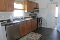 Just steps to the beach, bar, and playground park! - 2-Star