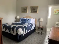 Ground level home steps from the beach in Waveland - 4-Star