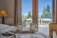 Charming 3-bedroom log cabin with Hot Tub and fitness room in delightful Big Sky - Balkon