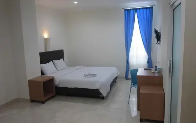 Hotel Familie 2 Metro Hotel dekat Lapangan samber