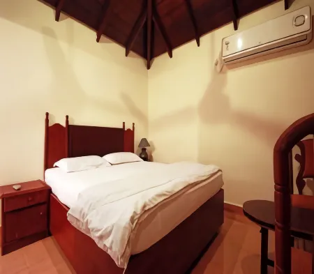 Malpe Sea Front Cottages Отели в г. Малп