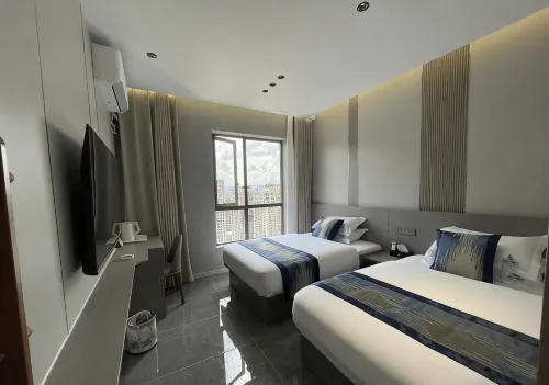 Liupanshui Qiuboju Homestay (Wanda Plaza) - parkir