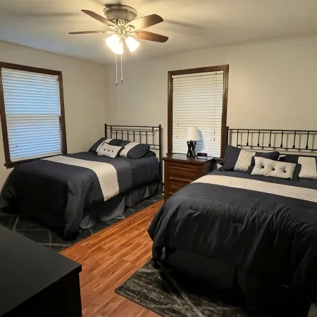 Spacious five-bedroom home off Back Lake with direct trail access on Spooner Rd