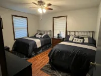Spacious five-bedroom home off Back Lake with direct trail access on Spooner Rd