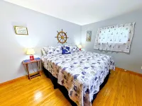 Johnson Homestead. One level living, ocean view with semi-private beach access.