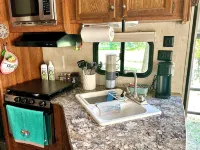Cozy Travel Trailer and Up River Get Away. Hike, Fish, Float, Relax!