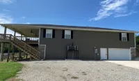 Private Riverfront Getaway with Direct Steps to Fishing Paradise.