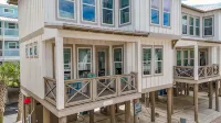 Quiet WHOLE HOUSE btwn the beach and Lagoon with pool, fishing dock, sunsets!! - Country Houses