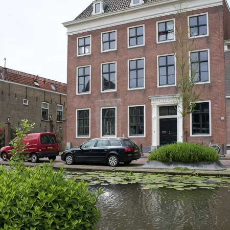 Canal house top floor in historic center Gouda