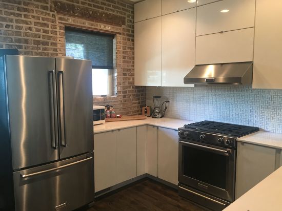 The entire FLAT.  Stay Like You Own! Central AIR. TWO FULL BATHROOMS. Unique.
