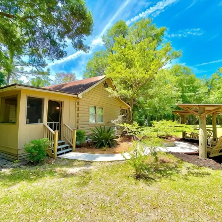 Secluded, peaceful Coastal Log Cabin with hot tub.