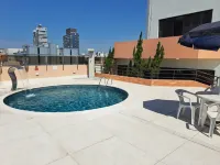 Cosmopolitan Praia Flat - piscina