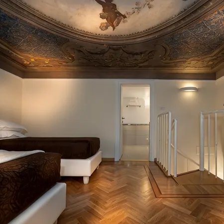 DVE Suite Rome Отели рядом с достопримечательностью «Базилика Санта-Парасседе»