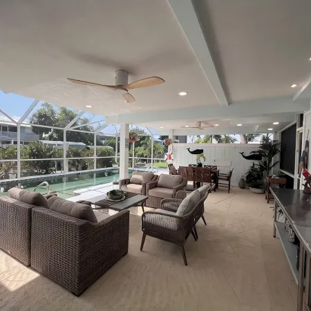 Antigua Cay Retreat is a stylish home with pool on deep water canal in Bokeelia
