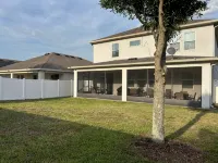 Cozy 4-bedroom house in Davenport- Haines City with WiFi, AC, Game Room, Screened Lanai - 3-Star