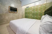 Umbrella Hotel Syariah by My Hospitality Hotel dekat Gor Bulutangkis Aspen