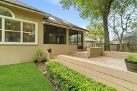 Four-bedroom mini estate, minutes from downtown Jax with a sunroom and backyard