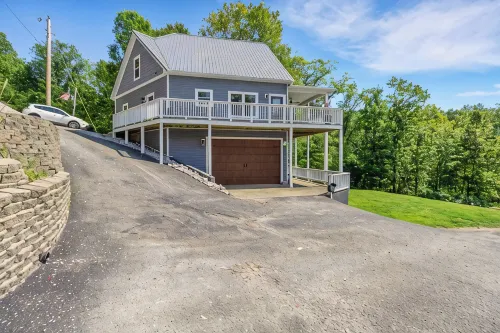 Charming Lakeside Escape w/ Large Deck & Firepit! - 4-Star