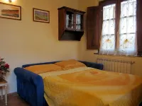 ORANGE APARTMENT in Poggio alla Cavalla farmhouse in the heart of Tuscany