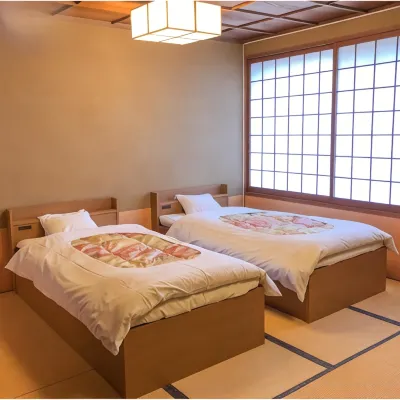 Togurakamiyamadaonsen Shunjyuan Kikusui Ryokan Отели рядом с достопримечательностью «Замок Уэда»