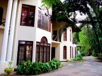 Tree Breeze Inn - Hotel/Alloggi familiari