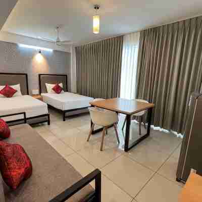 The White Orchid Luxury Service Apartments Rooms