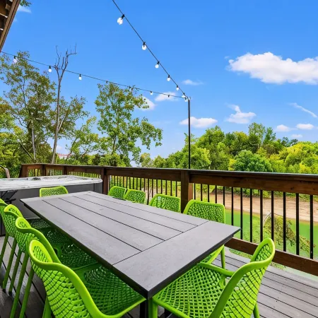 Lakefront home with retro accents, private pool, and private dock.