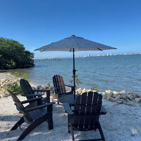 Waterfront luxury bungalow with private beach, paddleboards, kayaks and bikes!