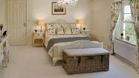 Caroe Farm House