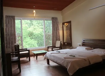 Nikhara Estate and Resort Hotels near MEIL PKG-3 CAMP