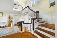 Waterfront Estate in Groton – 10 Bedrooms, Private Pier, & Beach Access