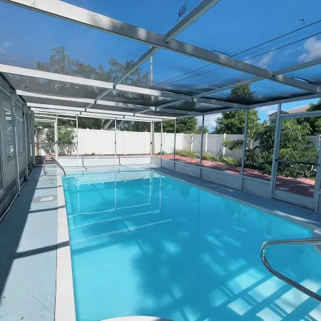 Quiet Pool Haven: 4BR - 9PPL, AC, WiFi, and Beaches Nearby