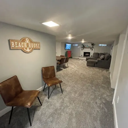 Enjoy this beach front lake home that boasts 66' of frontage with many amenities