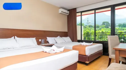 24 m² dengan 5 kamar tidur dan 5 kamar mandi pribadi di Batu Hotel di Kecamatan Batu
