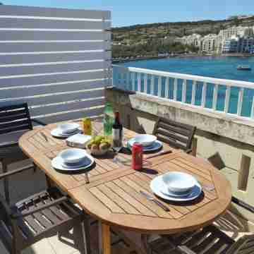 Blue Harbour Seafront Penthouse with Large Terrace with Panoramic Sea Views - by Getawaysmalta Dining/Meeting Rooms