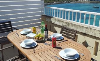 Blue Harbour Seafront Penthouse with Large Terrace with Panoramic Sea Views - by Getawaysmalta
