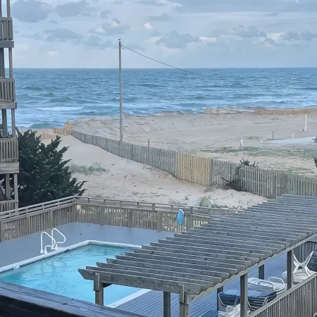 Expansive Ocean View: Private Balcony, Pool, Elevator & Executive Office