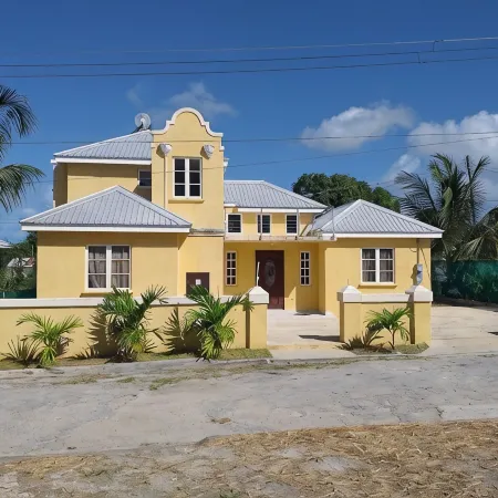 A modern and spacious house, steps to the beach with a private pool!!