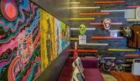 100% Cafe Moto Hostel
