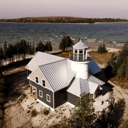 Bois Blanc Island Lighthouse Home. Iconic Sunset Views of the Mackinac Bridge!