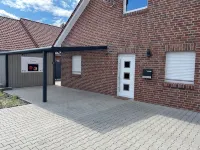 "elstar" - Barrierefreies Ferienhaus mit Carport Terrasse Netflix Free Wifi 梅彭住宿飯店
