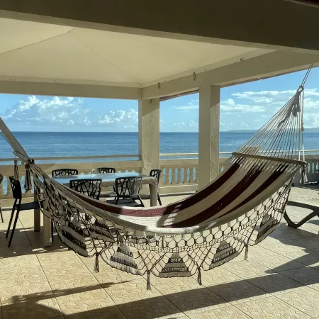 Oceanfront 3 Bdrm House on Surf Beach near Rincon with Private Beach Access Отели в г. Агуада