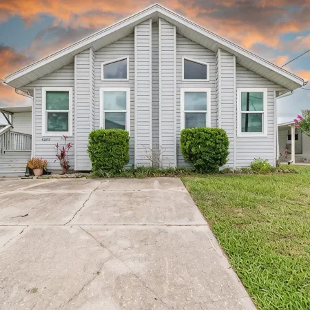 Waterfront retreat with boat dock & private ramp right off the river