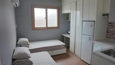 Sh Guesthouse Hotel di 